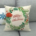 Close-up of linen pillow cover with Merry Christmas wreath on grey sofa - Christmas Wreath Blessing (10)