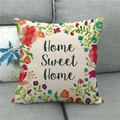 Christmas floral wreath Home Sweet Home linen pillow cover on a grey fabric sofa - Home Sweet Home Floral (13)