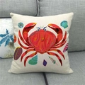 Close-up of linen pillowcase with vibrant red crab and colorful seashell ocean print - Bright Red Crab Shell Embellishment (5)