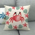 Detailed close-up of watercolor red crab and sea star print on linen pillow cover - Red Crab Symmetrical Starfish Shells (8)