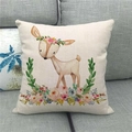 Close-up of linen pillowcase with watercolor cartoon deer and floral pattern on sofa - Cartoon Fawn with Wreath (5) / 18x18 Inch