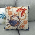 Nautical linen pillow cover featuring blue crab, starfish and sea fish on a grey sofa - Deep Blue Crab Vintage Marine Border (17)