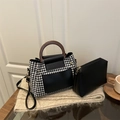 Houndstooth patchwork tote bag with wooden handle and matching black pouch on a scarf - Black