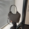 Borsa a secchiello grigio scuro con stampa leopardata e manici annodati dorati - Grigio