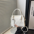 Elegant white faux leather handbag with crocodile texture and golden metal lettering - White