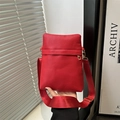 Red pebbled leather crossbody phone bag with wide nylon strap and gold hardware - Red