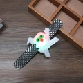 Detail of Halloween LED slap bracelet with white ghost plush on black sequined strap - Glowing Ghost Style