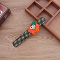 Detail of Halloween slap bracelet with plush orange pumpkin and gold polka dot fabric - Non-glowing Pumpkin Style