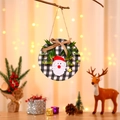 Christmas wreath door hanger with buffalo plaid wooden base and Santa Claus ornament - Grey Gnome