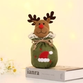 Detail der Weihnachts-Rentier-Geschenktüte aus Jute mit Spitze und Plüsch-Rentierkopf - Schneeflocken - Rentier
