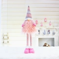 Gnome de Noël télescopique rose avec bonnet tricoté flocon et longues jambes rayées - Style Debout (Barbe Rose)