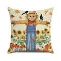 Detailed view of autumn scarecrow cushion cover with sunflower and pumpkin patterns - Scarecrow (1)