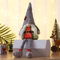 Lighted Christmas gnome plush with grey felt hat and glowing red belly on white stand - Gray
