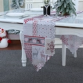 Christmas table runner with reindeer and snowflake patterns and scalloped edges - Grey