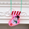 Pink Christmas felt stocking with snowman motif and green loop for holiday decoration - Snowman Style (Pink)
