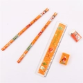 Detailed set of orange Christmas stationery with pencils, ruler, eraser and gift box - Yellow