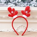 Close-up of red Christmas reindeer headband with white snowflake sequins and faux fur trim - Reindeer Style