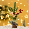 Mini Christmas tree with red berries and pine needles on a rustic wooden base - Yellow Flower Style