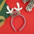 Detail van rendiergewei hoofdband met witte glitters, roze pluche stof en feestelijk decor - Zilver Gewei Stijl