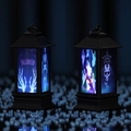 Detail of Halloween LED lantern showing blue light with ghost and skull patterns - Ghost