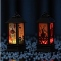 Detail of LED Halloween lanterns with Happy Halloween prints and warm glowing light effects - 3-Pumpkin Style