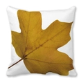 Square throw pillow case featuring a large golden autumn maple leaf on white fabric - 28