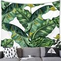 Detailed view of large tropical banana leaf tapestry hanging over a gray sofa - 100x70(Peach Skin) / Banana Leaf Style (3)
