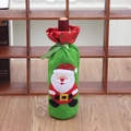 Detail of Christmas wine bottle cover with Santa Claus sequin embroidery and ribbon - Santa Claus