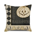 Macro view of Happy Halloween cushion cover with white pumpkin and checkered patterns - Standard Size