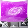 Hanging purple galaxy nebula tapestry displayed on a wall above a cozy grey sofa - Purple Spiral Galaxy (17)