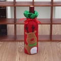 Detail of red Christmas wine bottle cover with reindeer motif and green sequins - Deer