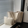 Two-piece cream white large tote bag set in premium PU leather with natural window lighting - White
