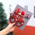Weihnachtsset mit Glitzerbrille, Sternspangen und Hut auf einer Displaykarte - Rote Buchstaben Stil