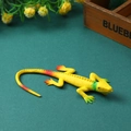 Realistic soft rubber yellow lizard prank toy with textured skin and colorful accents - Yellow Lizard