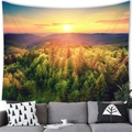 Scenic forest sunset wall tapestry displayed above a modern grey sofa in a cozy living room - 17