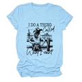 Detail of light blue cotton T-shirt featuring artistic desert cowgirl graphic and text - S / Light Blue (Black Letters)