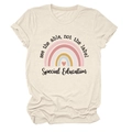 Detailed view of oatmeal cotton T-shirt featuring rainbow print and inspirational text - S / Sand (Black Text)