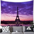 Eiffel Tower wall tapestry featuring a purple sunset cityscape over a living room sofa - 150x100(Peach Skin) / Purple Night View (1)