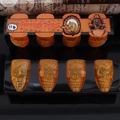 Set of 4 orange skull shot glasses 1.8 fl oz in packaging for Halloween party decor - Skull Shape (Halloween Skull Cup)