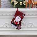 Detail of Christmas stocking with Santa Claus applique and plaid accents on fireplace - Burlap Stocking [Medium Style A] Santa Claus