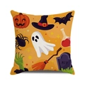 Macro shot of Halloween pumpkin and ghost pattern on textured linen cushion cover - Orange Tone RIP Cemetery Element Style (16)