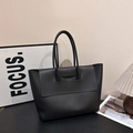 Minimalist large black leather tote bag with a sleek flap closure for office or daily wear - Black
