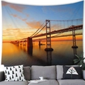 High-definition sunset beach tapestry hanging over a modern sofa in a cozy living room - Sunset Bridge (8)