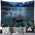 Wall tapestry featuring a snow mountain lake landscape displayed above a modern sofa - Snowy Mountain Lake (15)