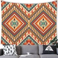 Detailed view of Aztec geometric tapestry hanging above a modern sofa as wall decor - 100cmx70cm / Pattern 1