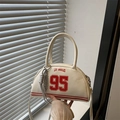 Borsa bowling bianco crema Los Angeles 95 con strisce rosse e stile varsity - Bianco