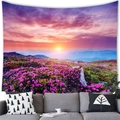 Detail of floral tapestry hanging above a grey sofa with mountain landscape and purple flowers - 100cmx70cm
