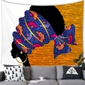 Detail of African woman tapestry hanging above a gray sofa in a modern artistic living room - 16 / 100x70(Peach Skin)