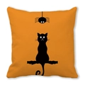 Detailed close-up of orange Halloween cushion cover featuring black cat and spider silhouette - Cat and Spider (5)