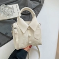 Chic shirt-style beige leather handbag with marble texture and adjustable strap - White